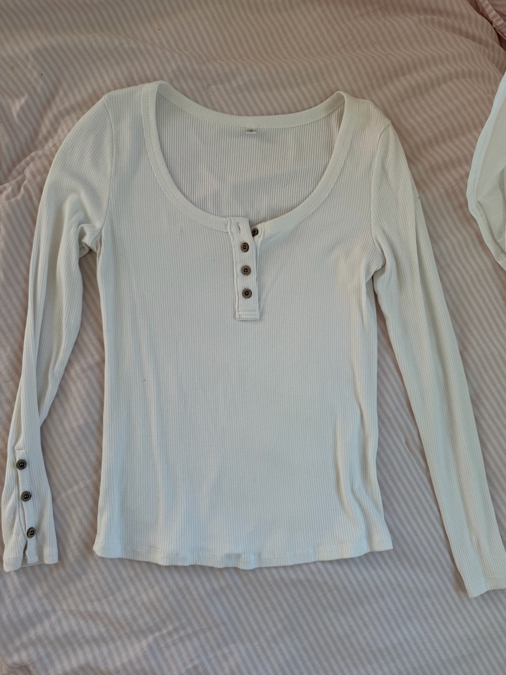 White henley top with button details
